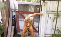 Blonde milf smears poop on her body outdoor